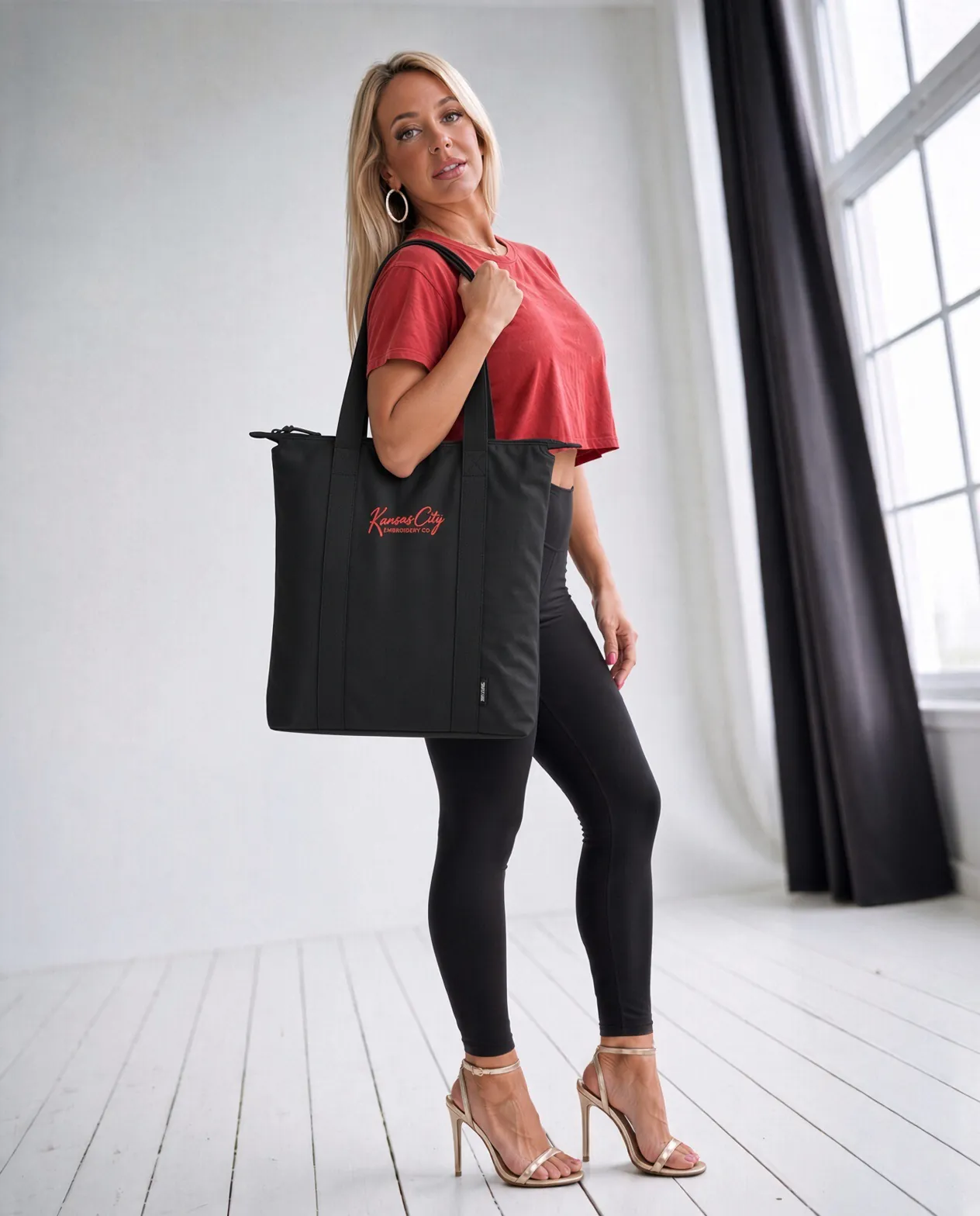 Kansas City Embroidery Co. Embroidered Tote in Black, on a model