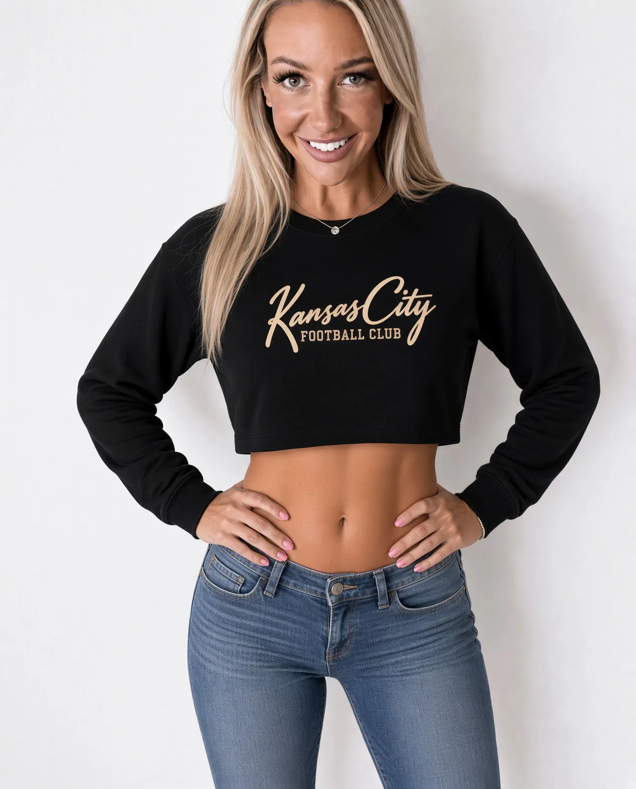 Kansas City Football Club Women's Cropped Sweatshirt in Black, on a model