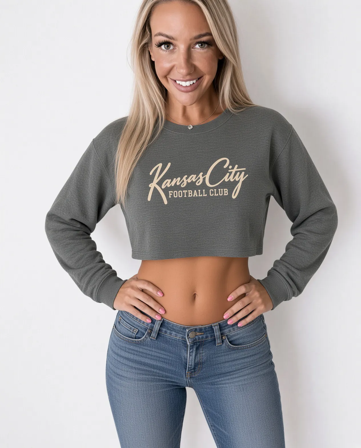 Kansas City Football Club Women's Cropped Sweatshirt in Heather Grey, on a model