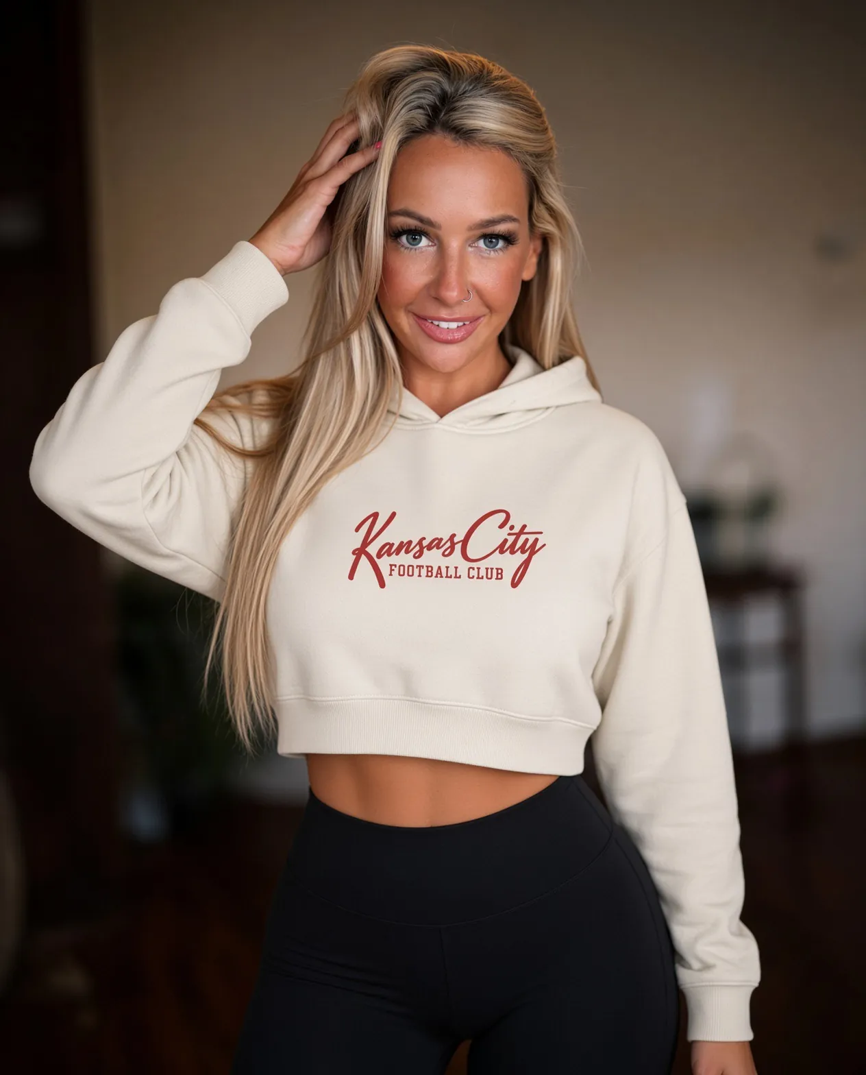 Kansas City Football Club Cropped Hoodie in Bone, on a model
