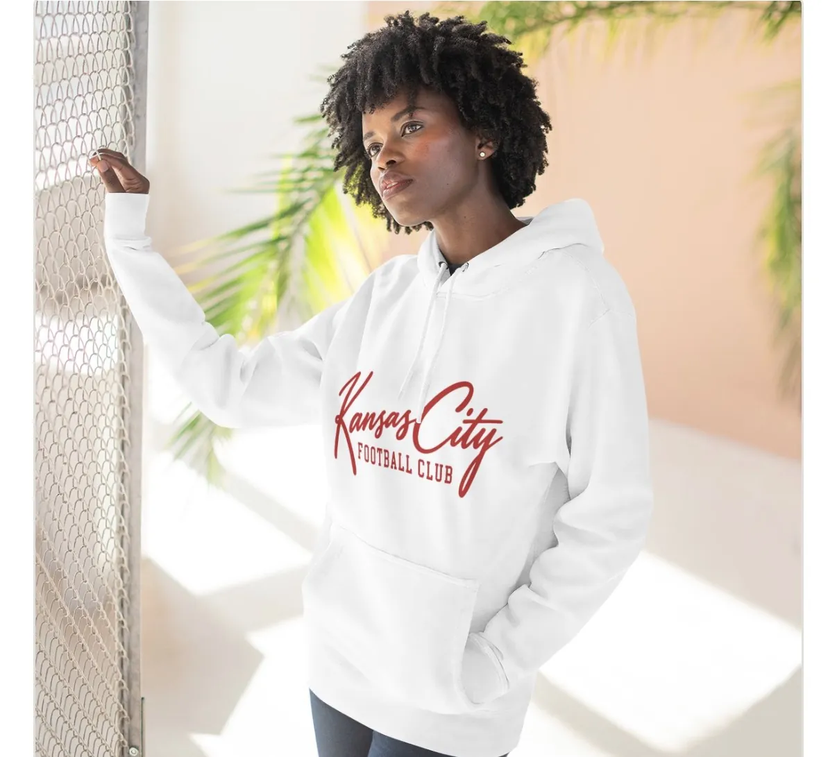 Kansas City Football Club Hoodie in White, on a model