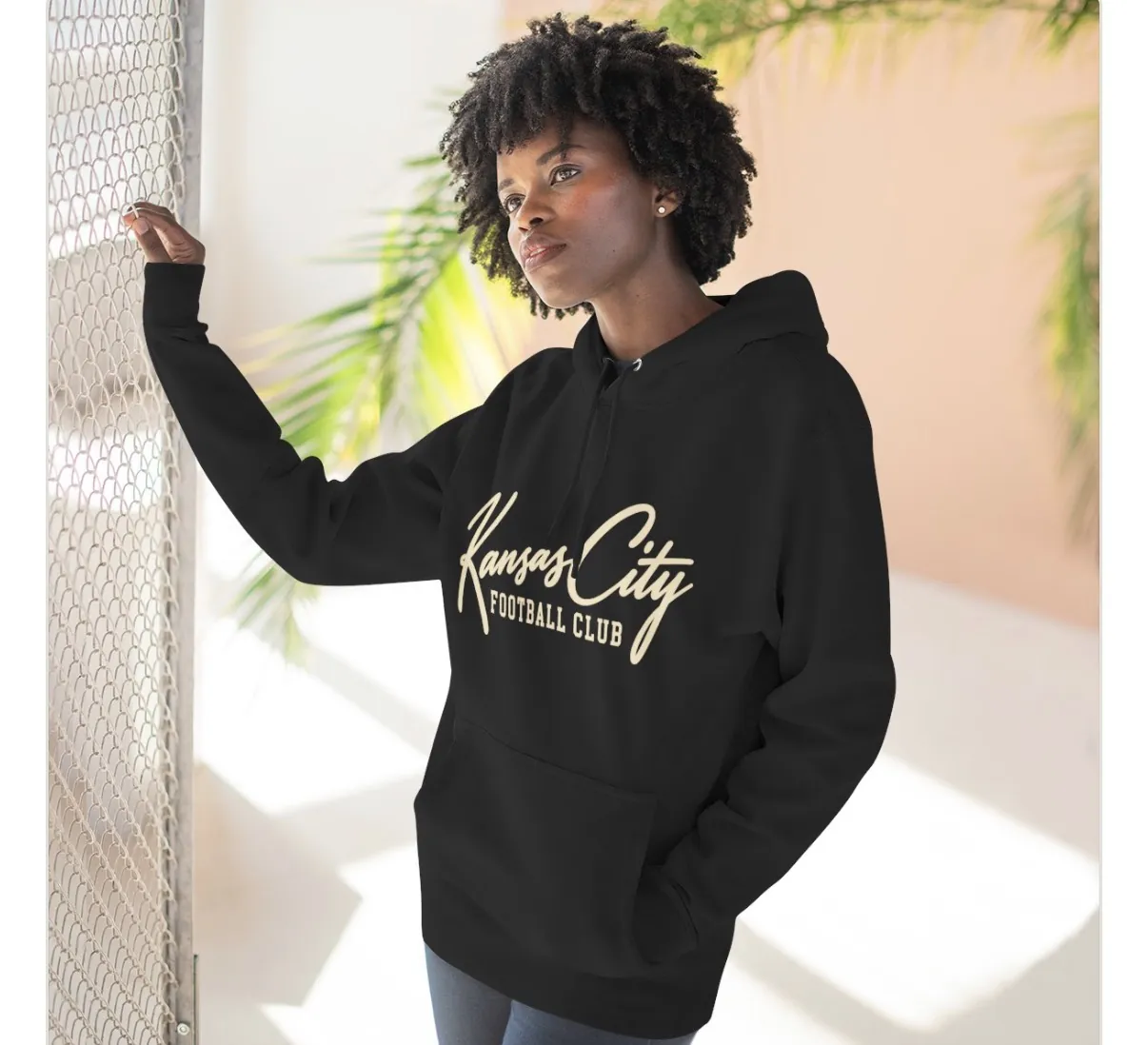 Kansas City Football Club Hoodie in Black, on a model