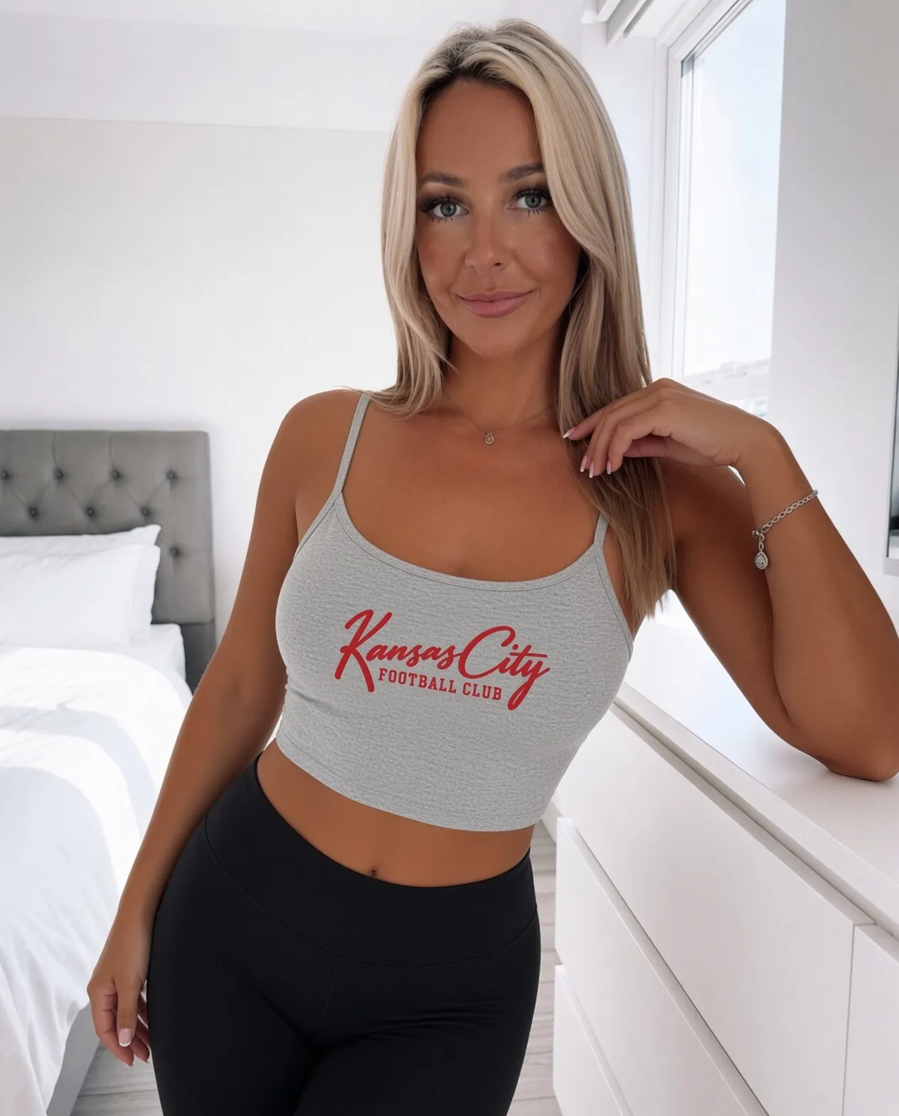 Kansas City Football Club Women's Spaghetti Strap Tank in Athletic Heather, on a model